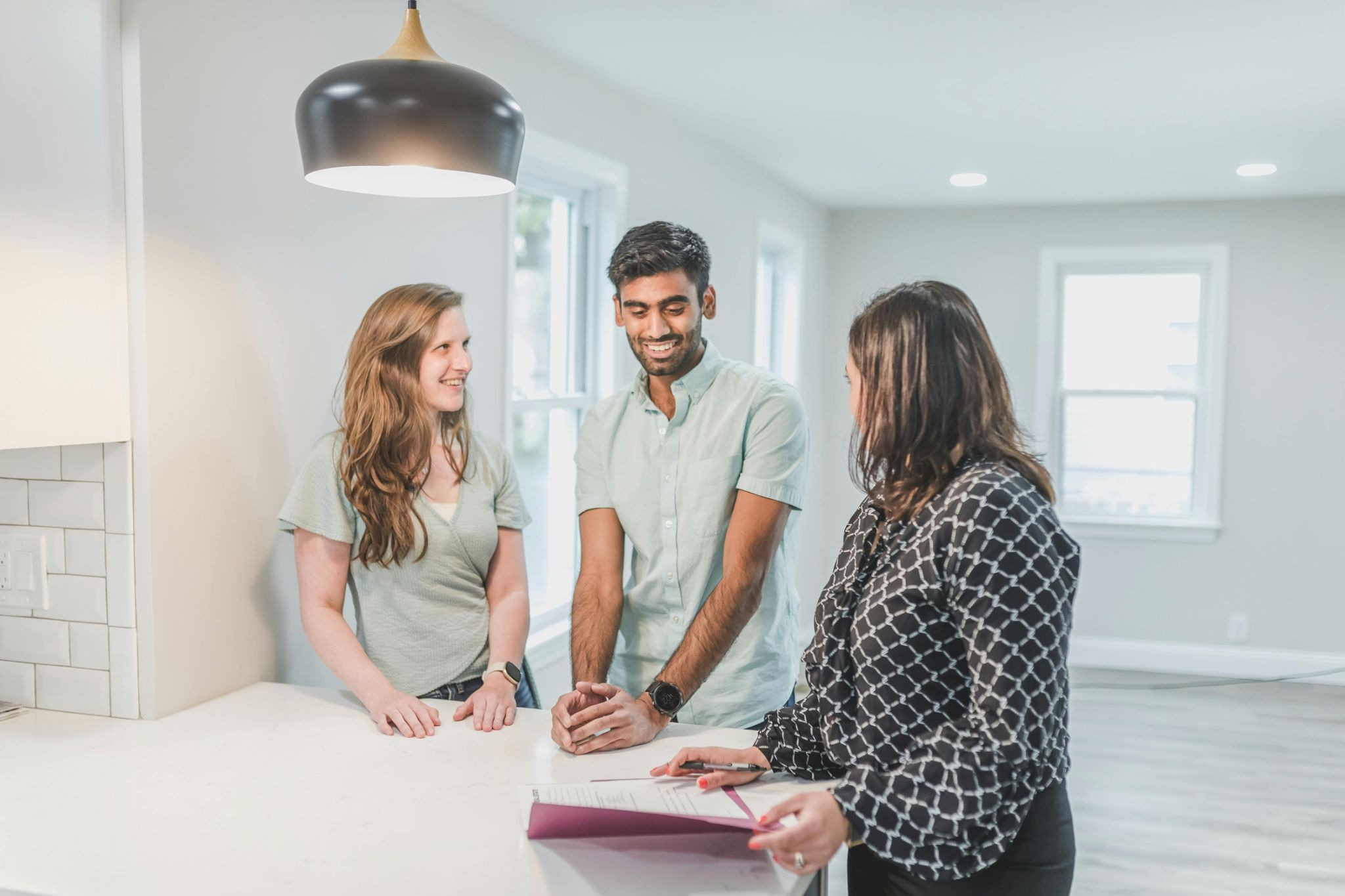 people talking at a counter
