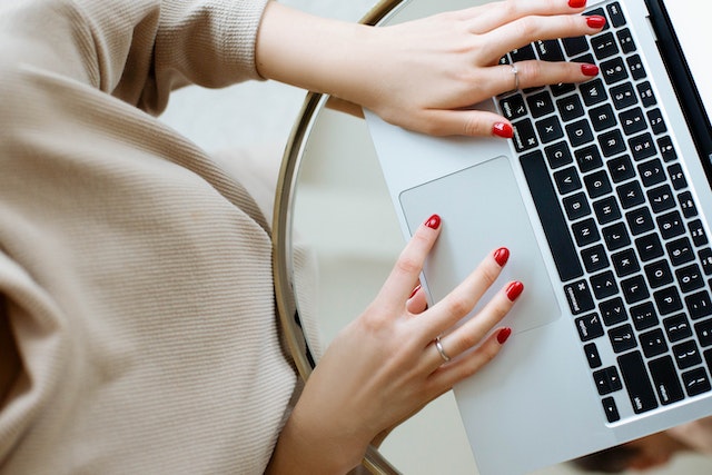  someone's hands using a laptop