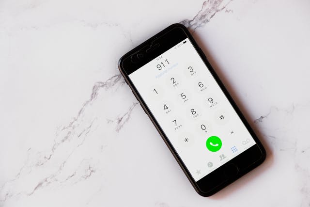 a phone set to call "911"